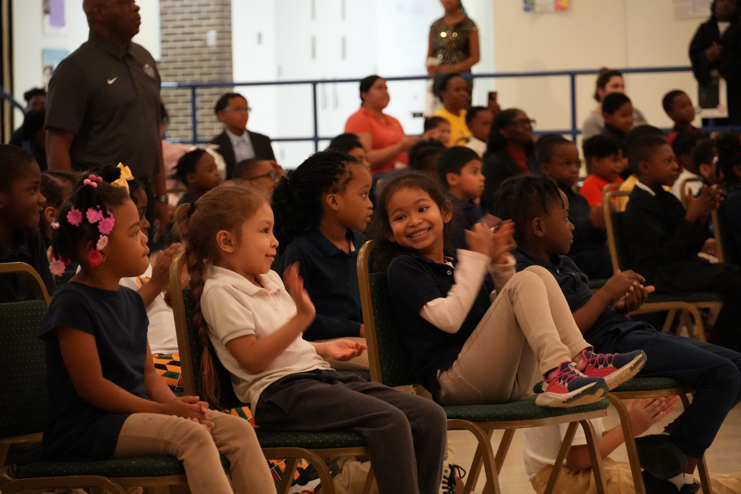 Andrew J. Brown Academy students applaud during a Black History Month celebration.