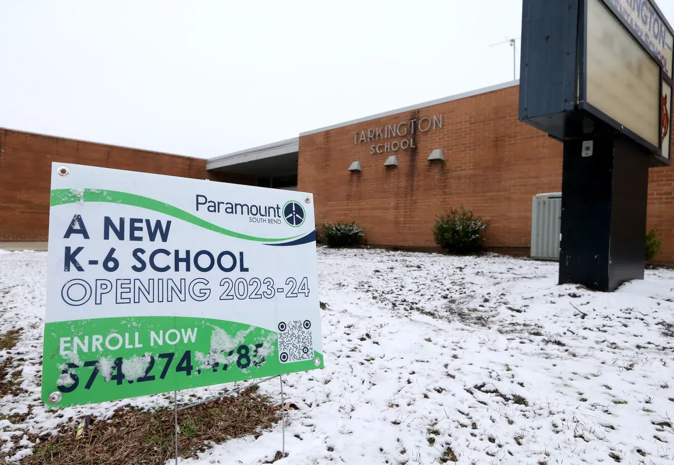Paramount South Bend enrollment sign outside the former Tarkington School building.