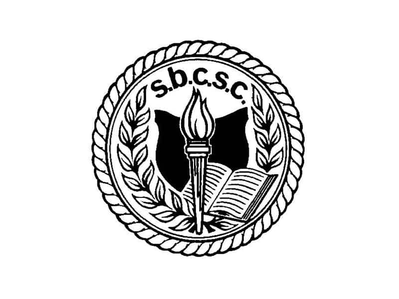 South Bend Community School Corporation seal featuring a torch and open book.