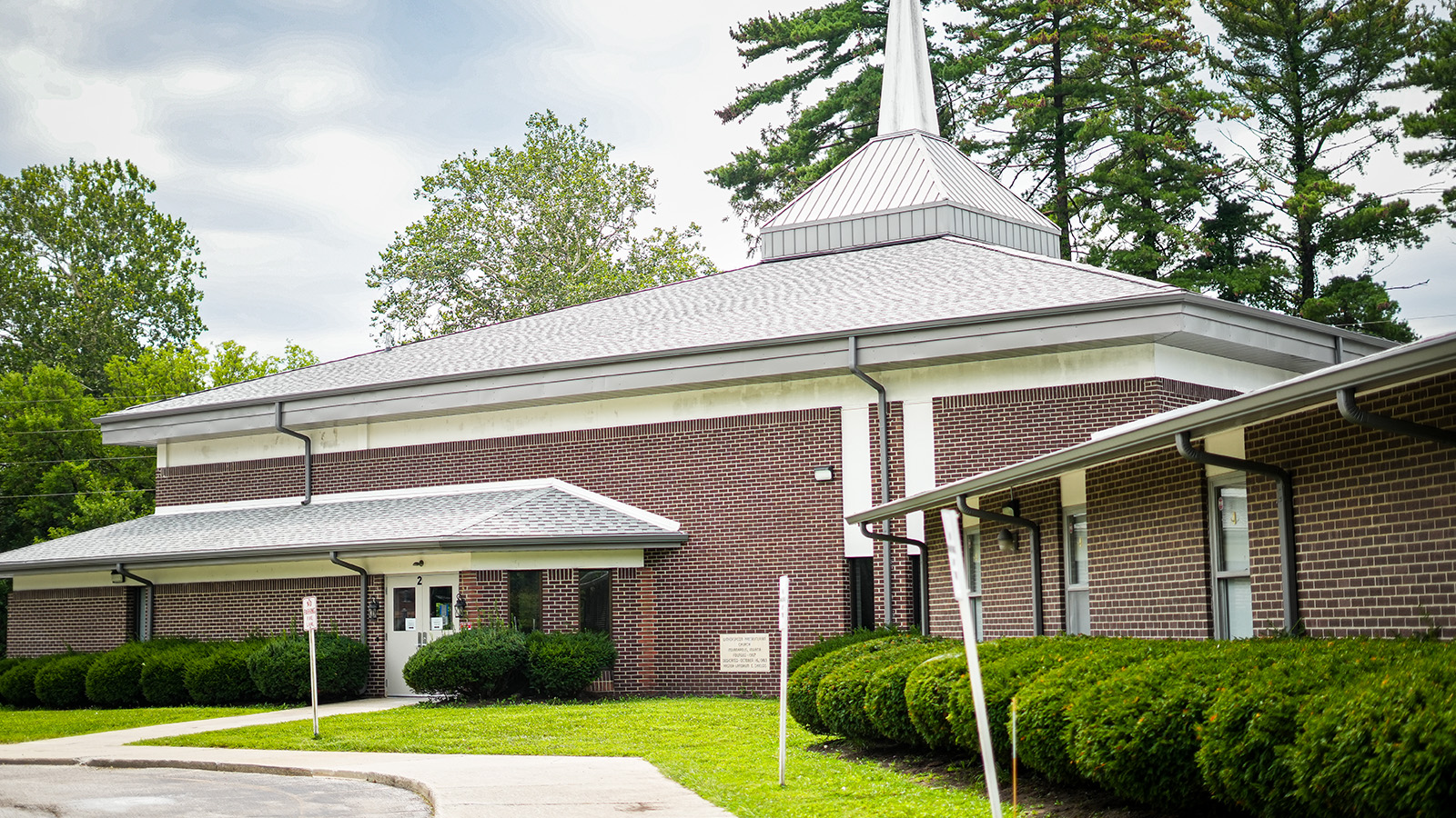 gisa-tour-hero Exterior of Girls IN STEM Academy in Indianapolis featuring the brick school building, main entrance, and steeple