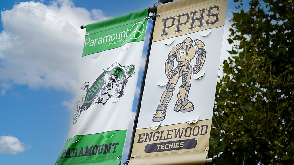 Paramount Englewood school banners featuring the school mascot and Englewood Techies logo