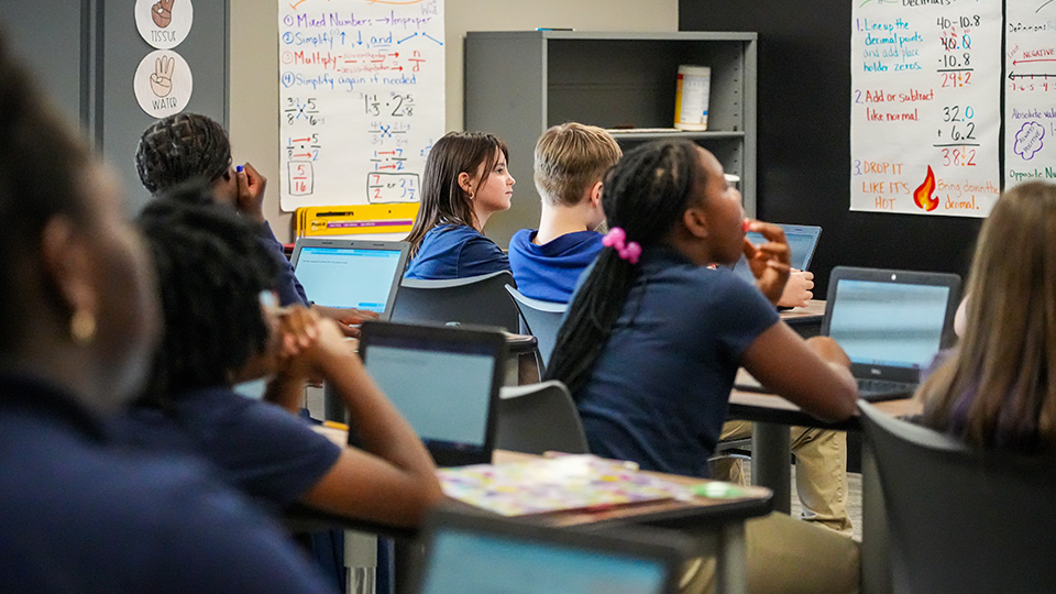 Paramount Lafayette students using laptops during a classroom math lesson