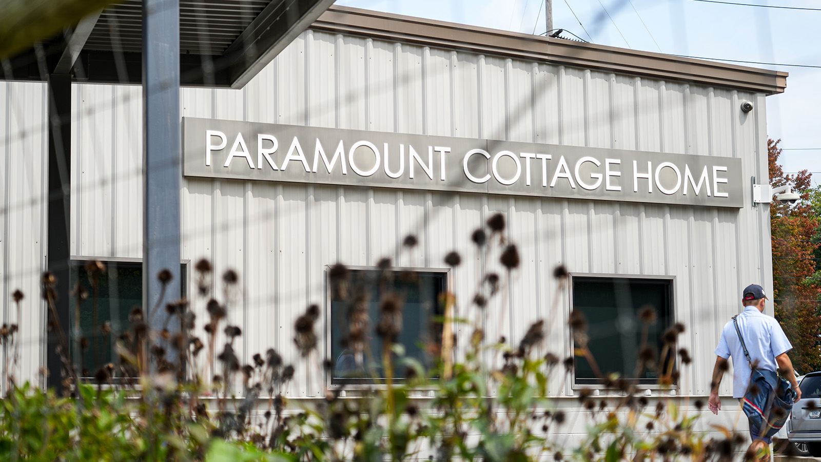 Exterior of the Paramount Cottage Home school building in Indianapolis, featuring the school's name prominently displayed above the windows